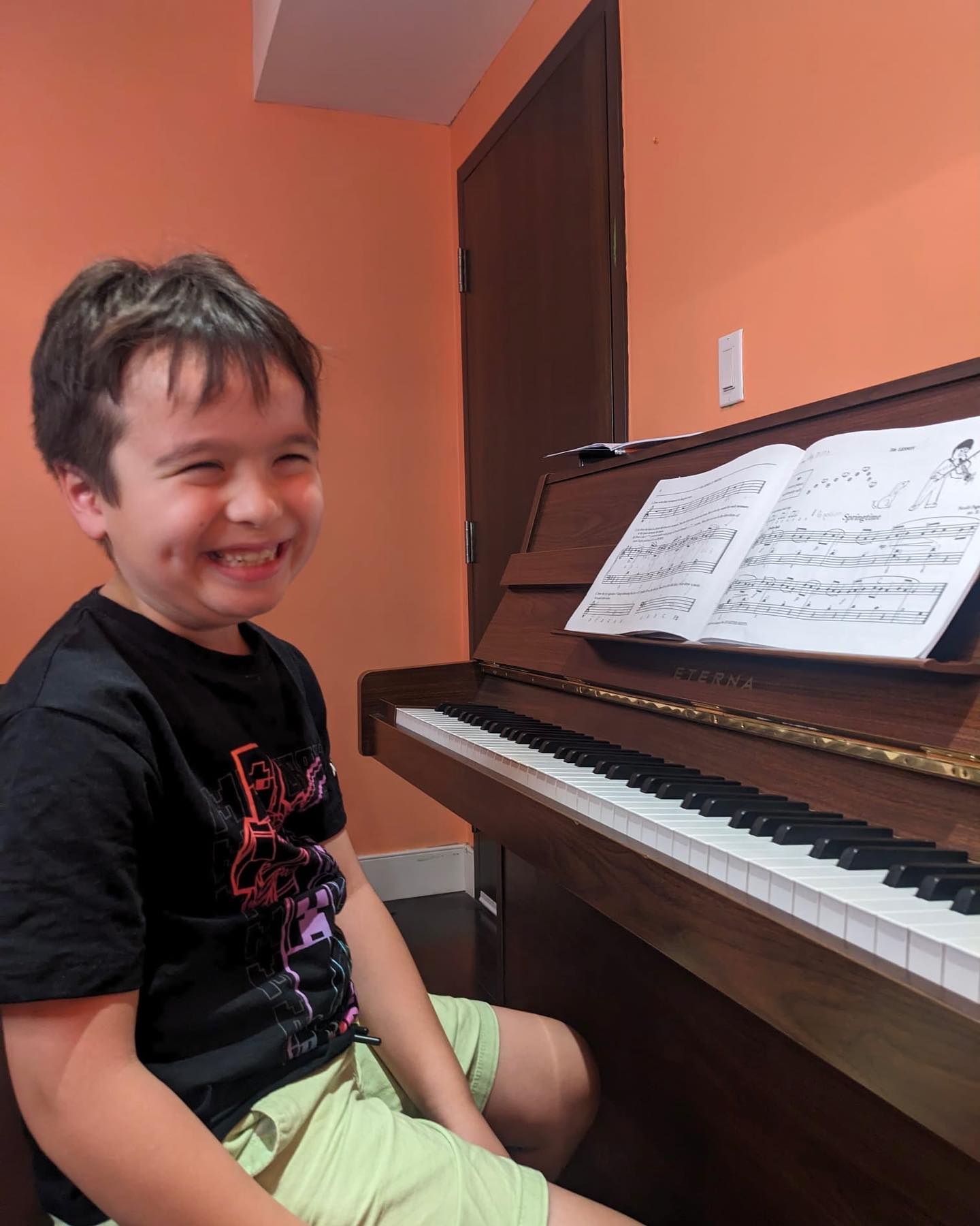 one of our amazing piano students during his lesson