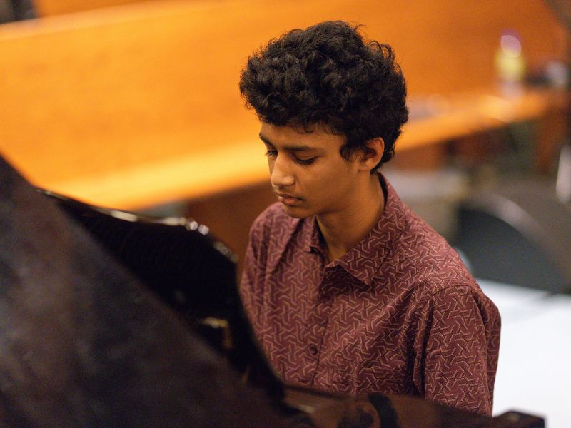 Akhil performing piano at Da Capo Academy of Music