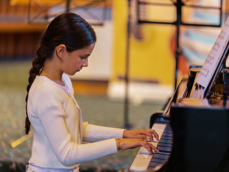 Chloe performing piano at Da Capo Academy of Music