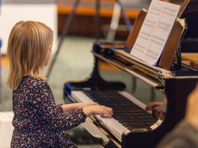 Emilia performing piano at Da Capo Academy of Music